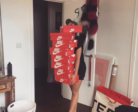 Ella Eyre is buried under a lot of trainers