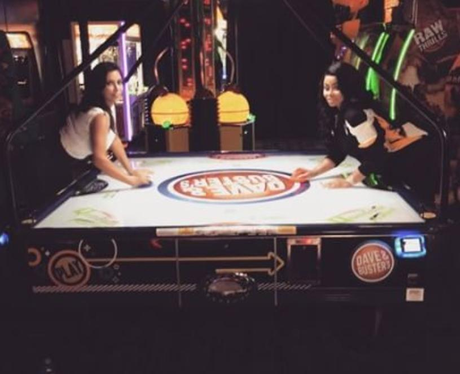 Kim Kardashian and Blac Chyna play air hockey at K