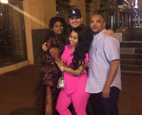 Blac Chyna and Rob Kardashian pose with her parent
