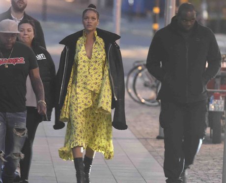 Rihanna wows on the sidewalk in brightly coloured