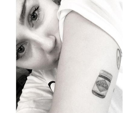 Miley Cyrus shows off new Vegemite tattoo