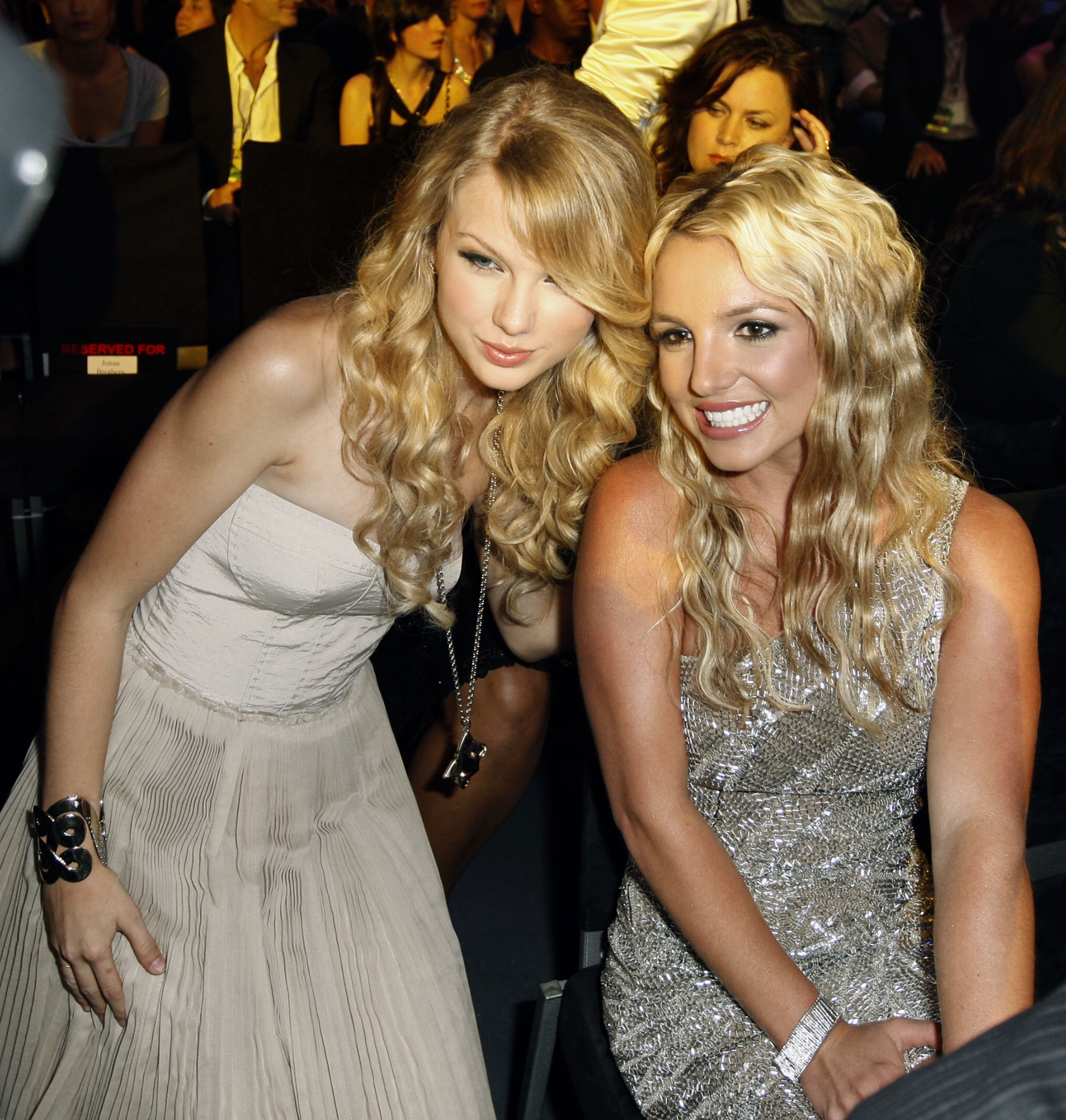 Taylor Swift, left, poses with Britney Spears at t