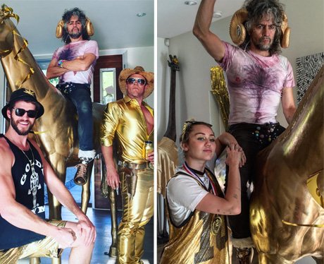 Liam Hemsworth and Miley Cyrus attend family party