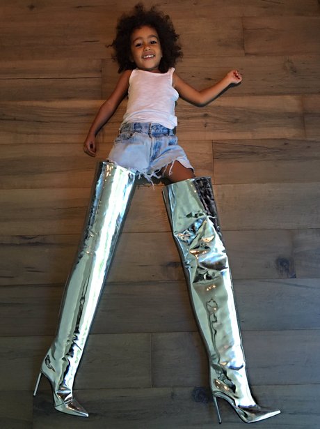 North West wears Kim Kardashian's shoes