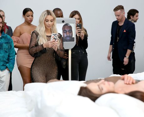 Kim Kardashian facetimes Kanye West during exhibit