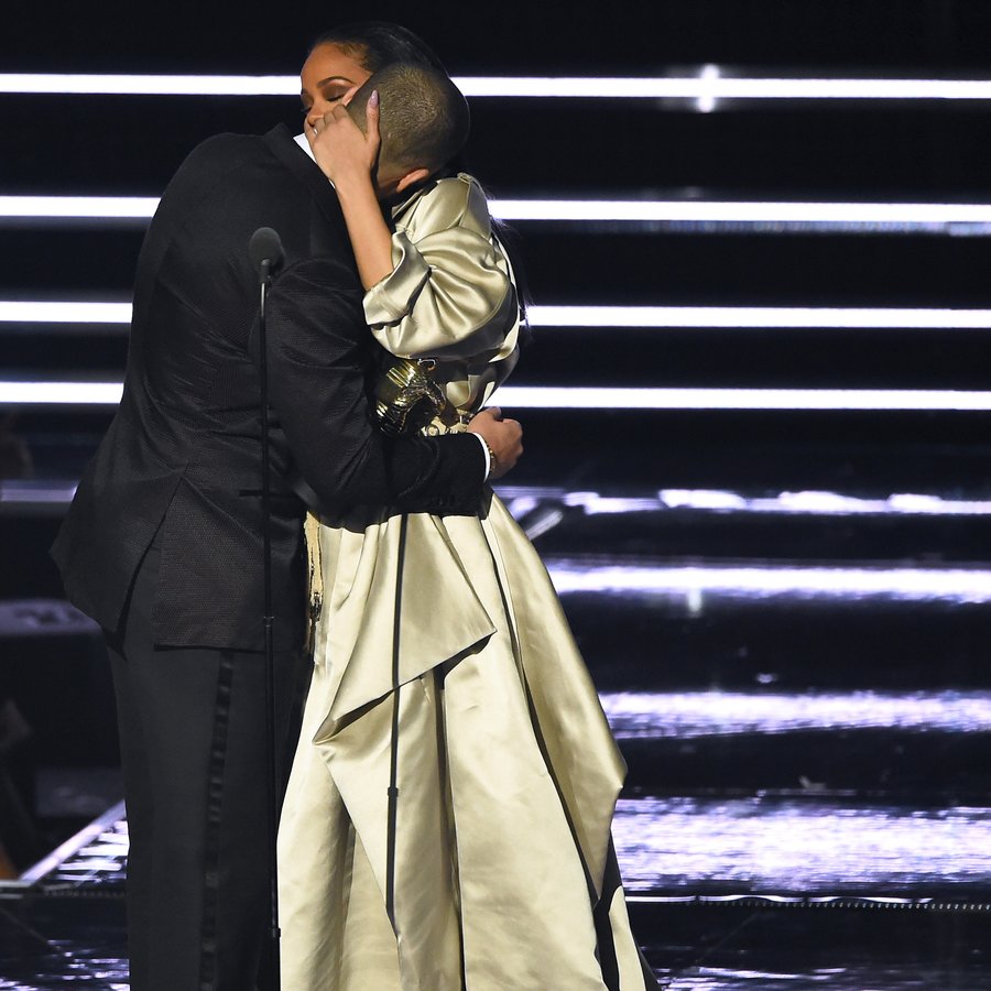 Rihanna embraces Drake as she accepts the Michael Jackson Video Vanguard Award at the MTV Video Music Awards