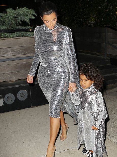 kim and north in sequin dresses