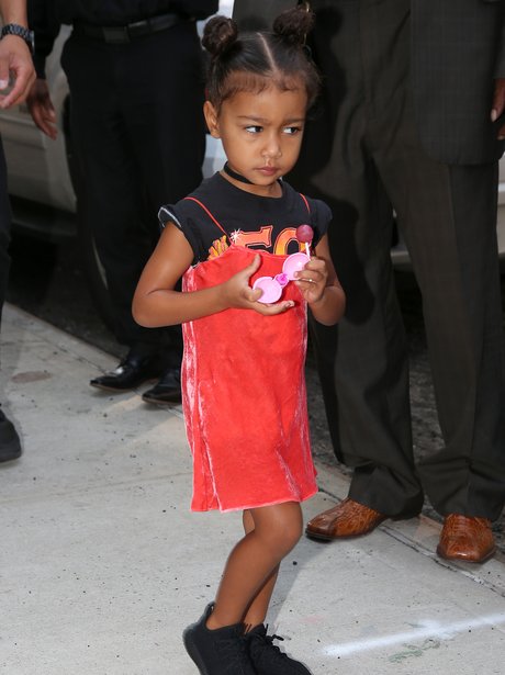 North West looks adorable in slip dress and t-shir