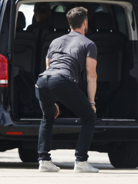 Chris Hemsworth stretching