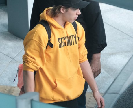 Brooklyn Beckham wearing Justin Bieber Purpose tou