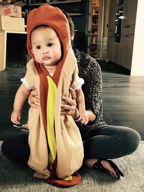 Chrissy Teigen continues to dress her baby Luna up