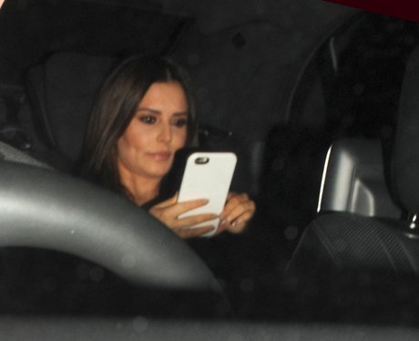 Cheryl caught texting as she lives TV appearance