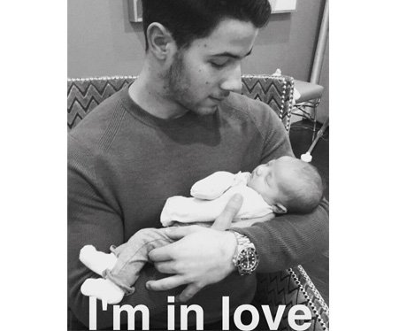 Nick Jonas meets his new niece, Valentina