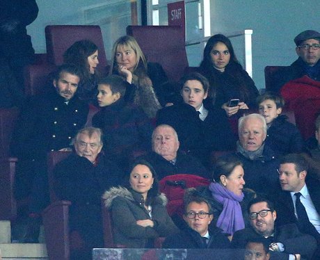 David Beckham takes his sons to the football