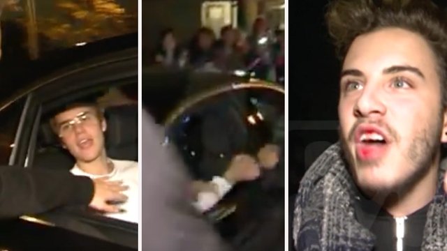 Justin Bieber punches fan 