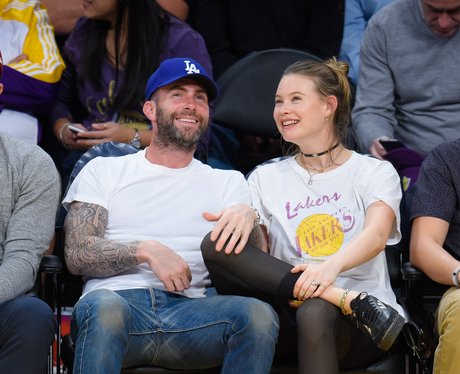 Adam Levine takes his wife to a basketball game