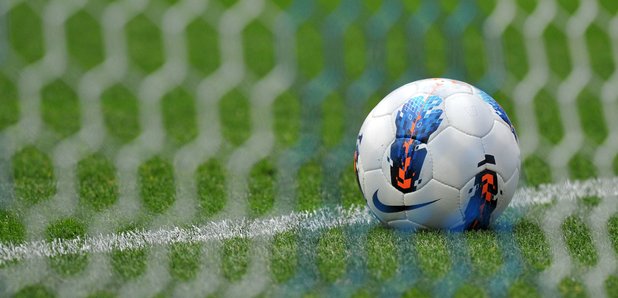Football on a pitch