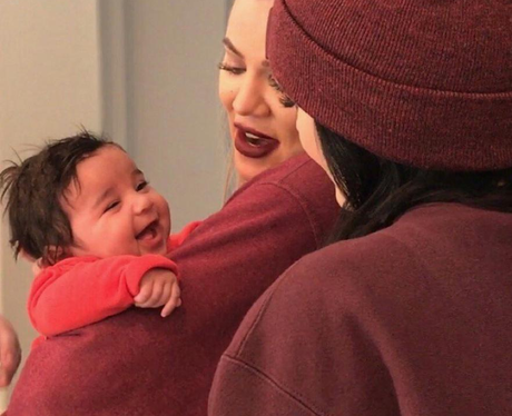 Khloe Kardashian and Kylie Jenner give Dream a hug