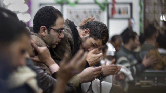 Muslims pray inside a mosque
