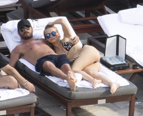 Scott Disick cosies up to mystery women
