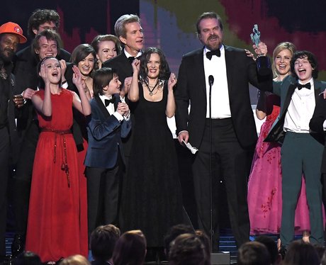 Stranger Things cast accept their award but all ey