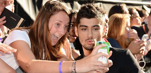 ZAYN with fans on the red carpet