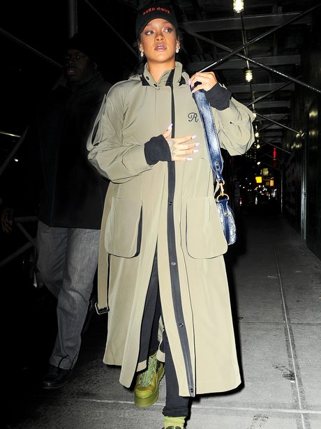 Rihanna attempts to go incognito in a cap and tren