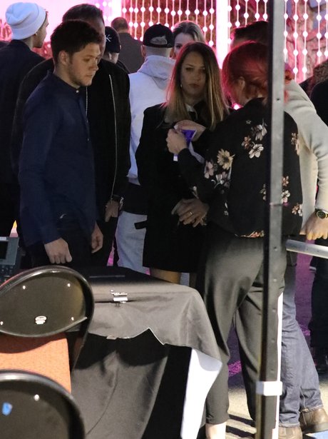 Niall Horan leaving concert with female