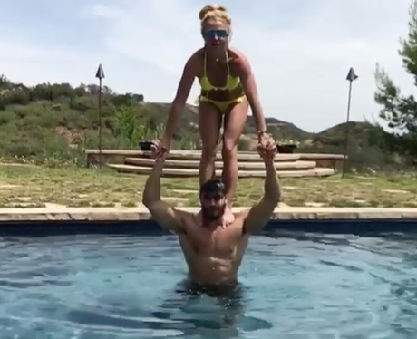 Britney Spears plays around with her boyfriend in 