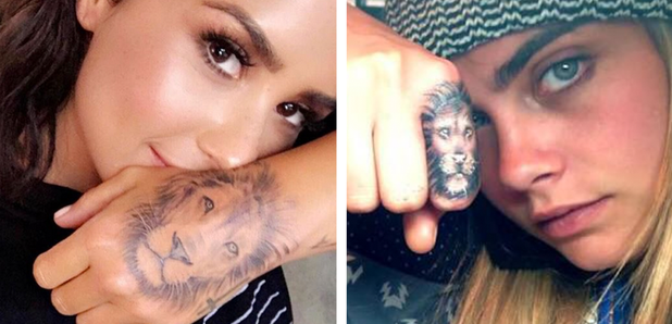 Demi Lovato shows off her fierce new hand tattoo