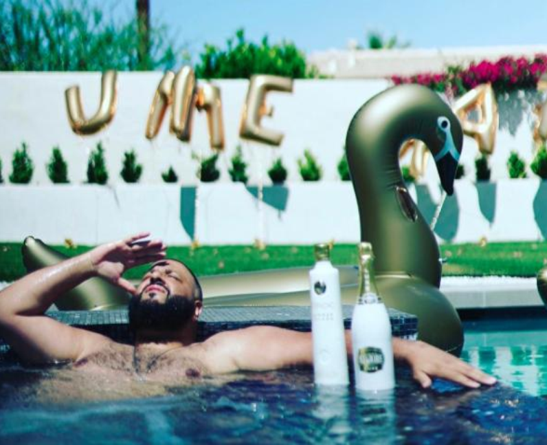 DJ Khaled with an inflatable flamingo