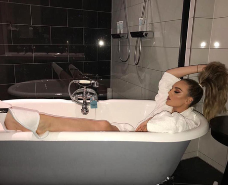 Perrie Edwards lounges in the bath