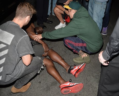Justin Bieber runs over a pap