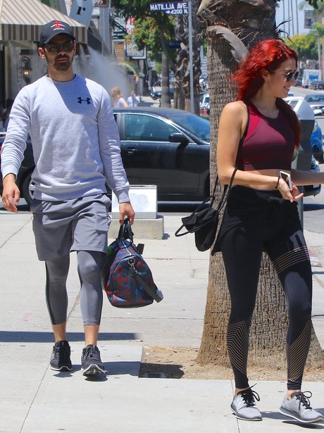 Joe Jonas out for lunch with mystery redhead and b