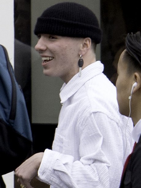 Rocco Ritchie puts a key through his ear