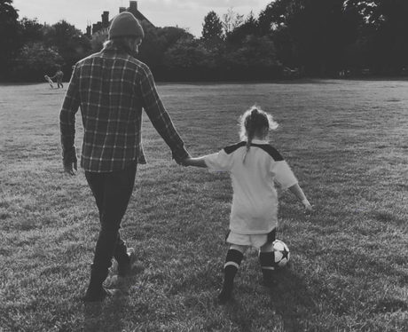 David Beckham takes Harper for her first football