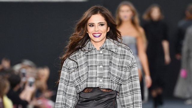 Cheryl takes to the L'Oreal catwalk after giving b