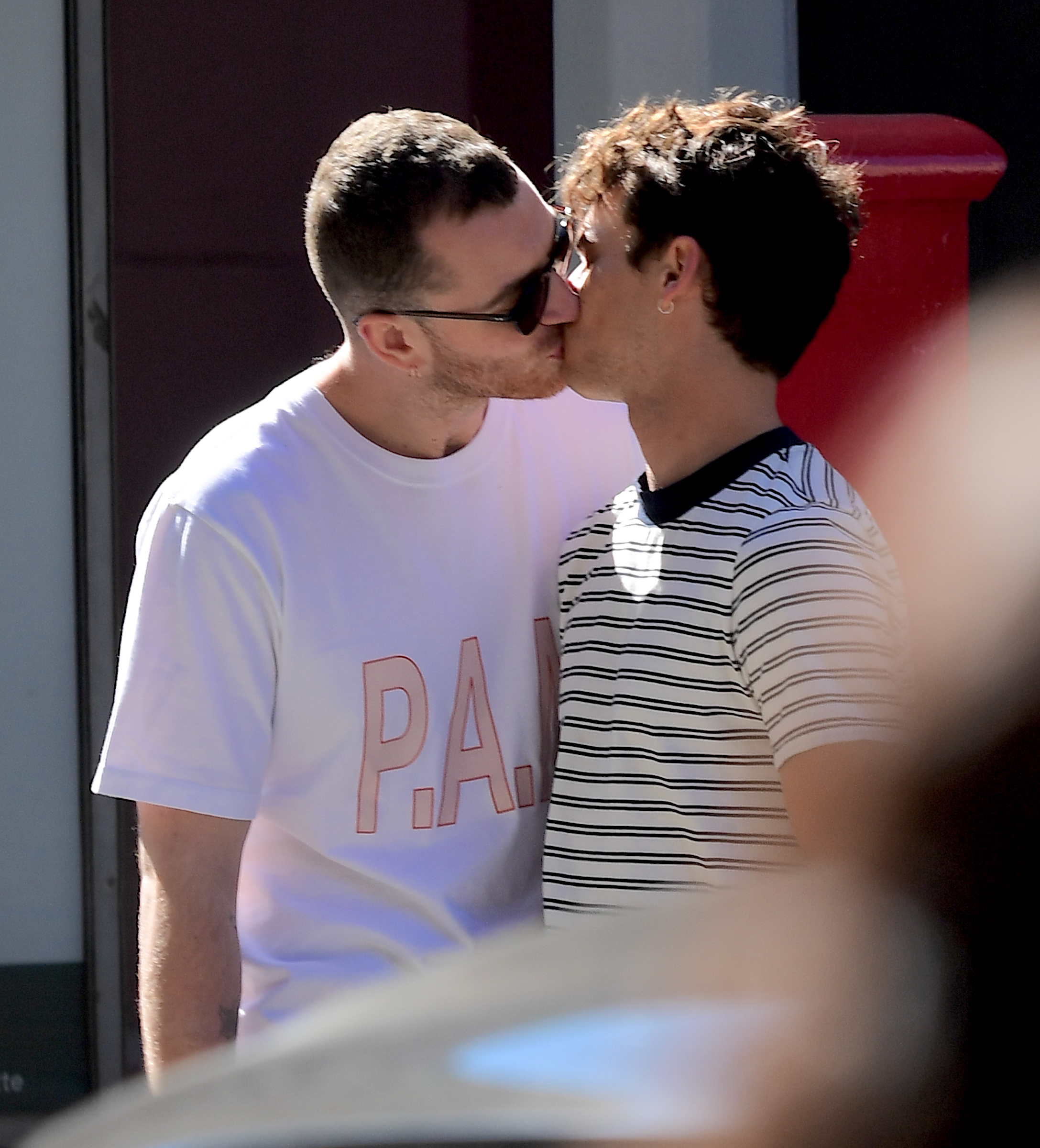 Sam Smith kisses boyfriend Brandon Flynn