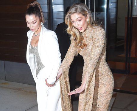 Gigi Hadid almost trips over her dress
