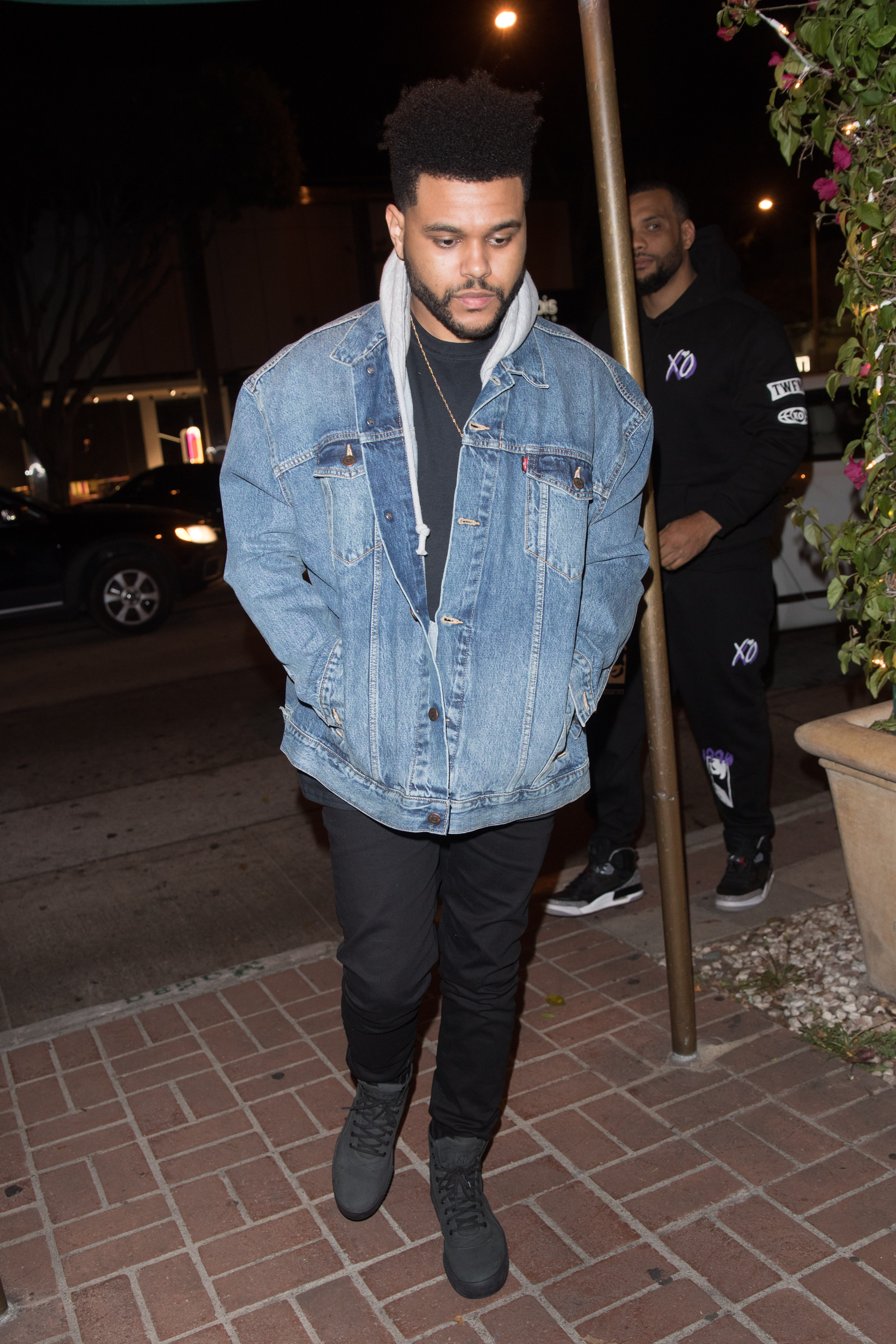 The Weeknd arriving at Madeo Restaurant to meet up