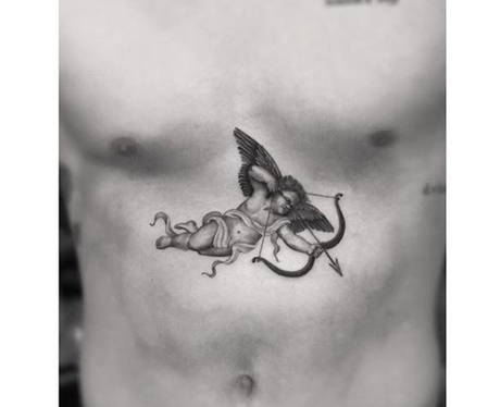 Brooklyn Beckham cupid tat