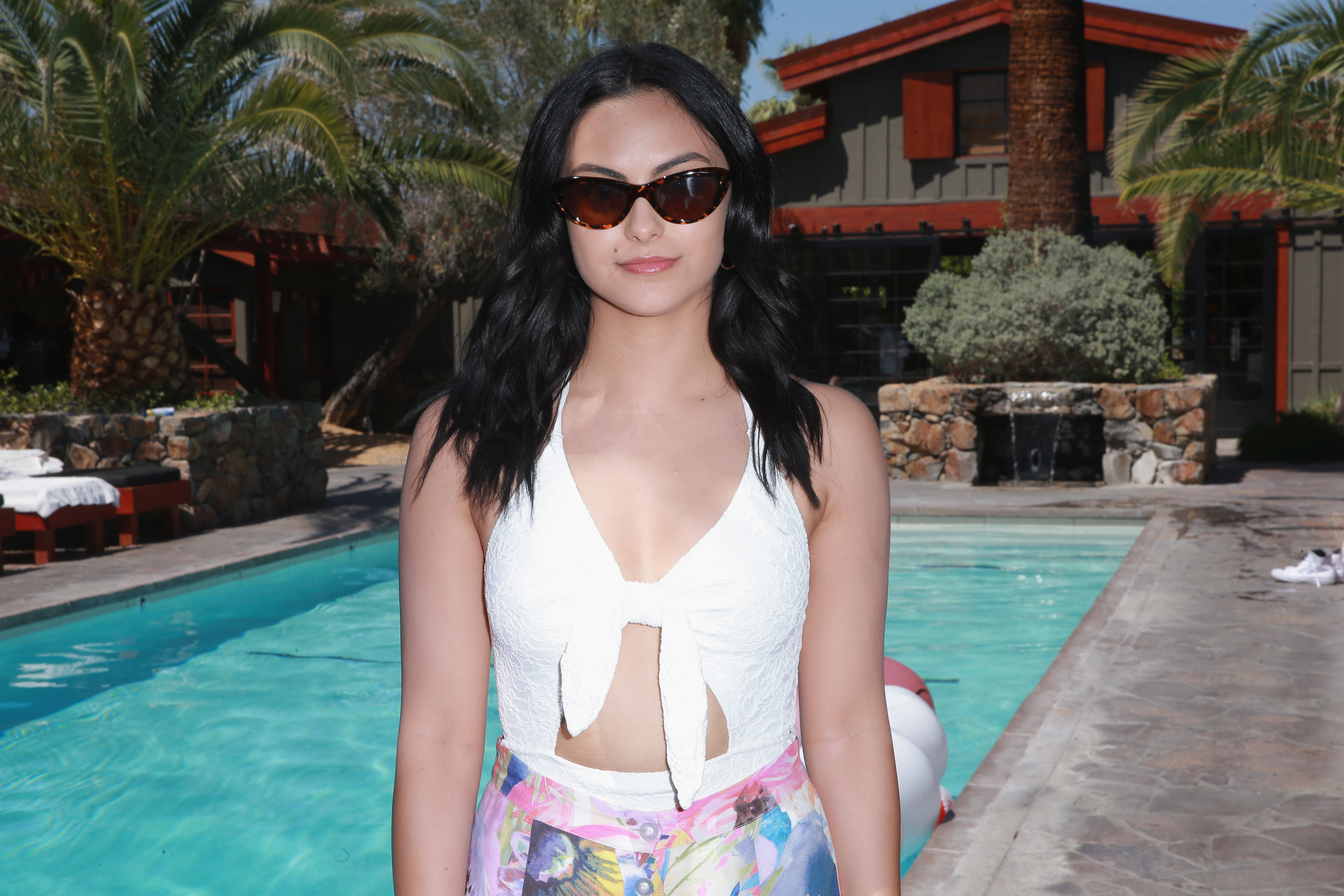 Camila Mendes Poolside with H&M
