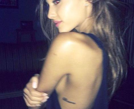 Ariana Grande's 'Bellisma' rib tattoo