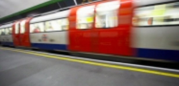 tube train going through station