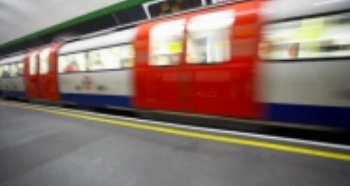 tube train going through station