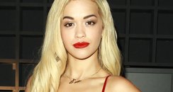 Rita Ora wearing a PVC dress